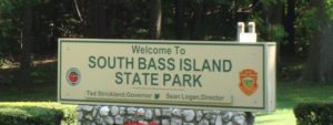 A photo of the welcome to south bass island state park sign.